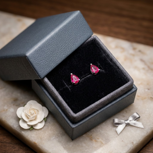 Pear-Cut Crimson Ruby Studs in Sterling Silver